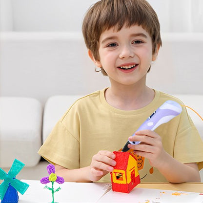 garcon fait une maison avec stylo 3 D