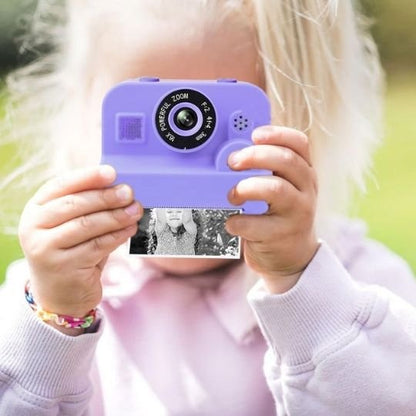 fillette avec appareil photo enfant instantané