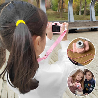 fillette prend photo en voyage avec appareil photo enfant