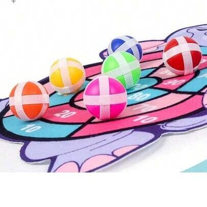 Boules adhésives sur jeux de flechettes